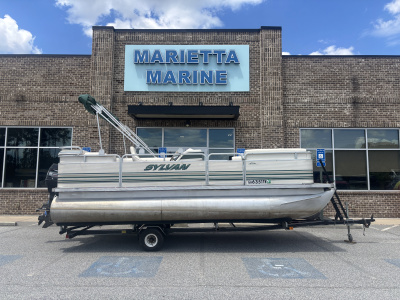 1999 Sylvan Elite 820 w/New Tohatsu Engine and Single Axle Trailer Included